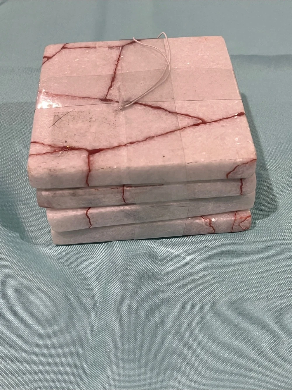 White Marble Coaster Set with Red Veining